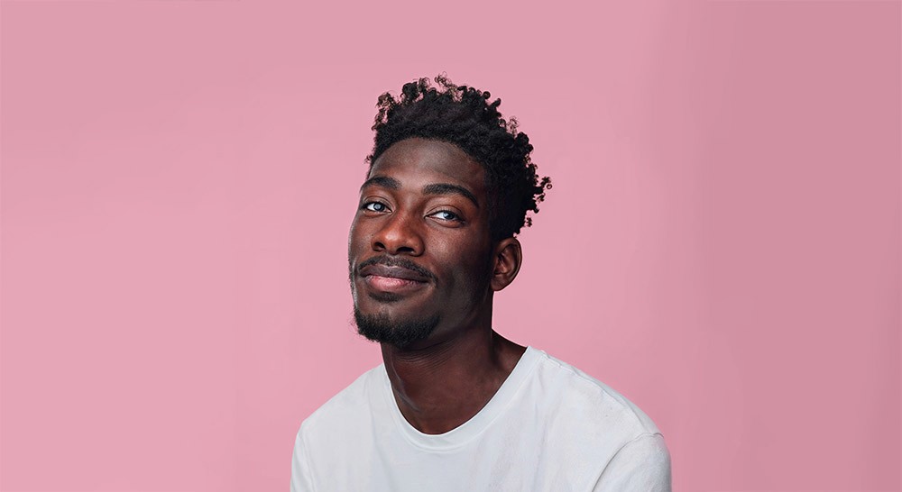 portrait of a handsome young black man smiling
