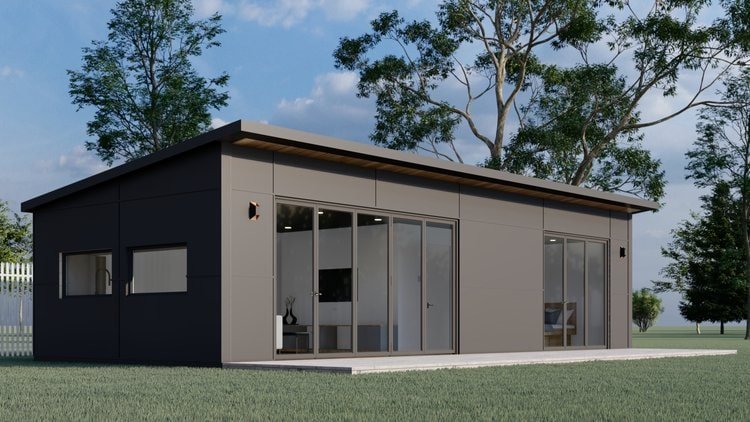 Side view of a modern modular unit with a sleek dark exterior, large sliding glass doors, and a minimalist design, surrounded by grass and trees.
