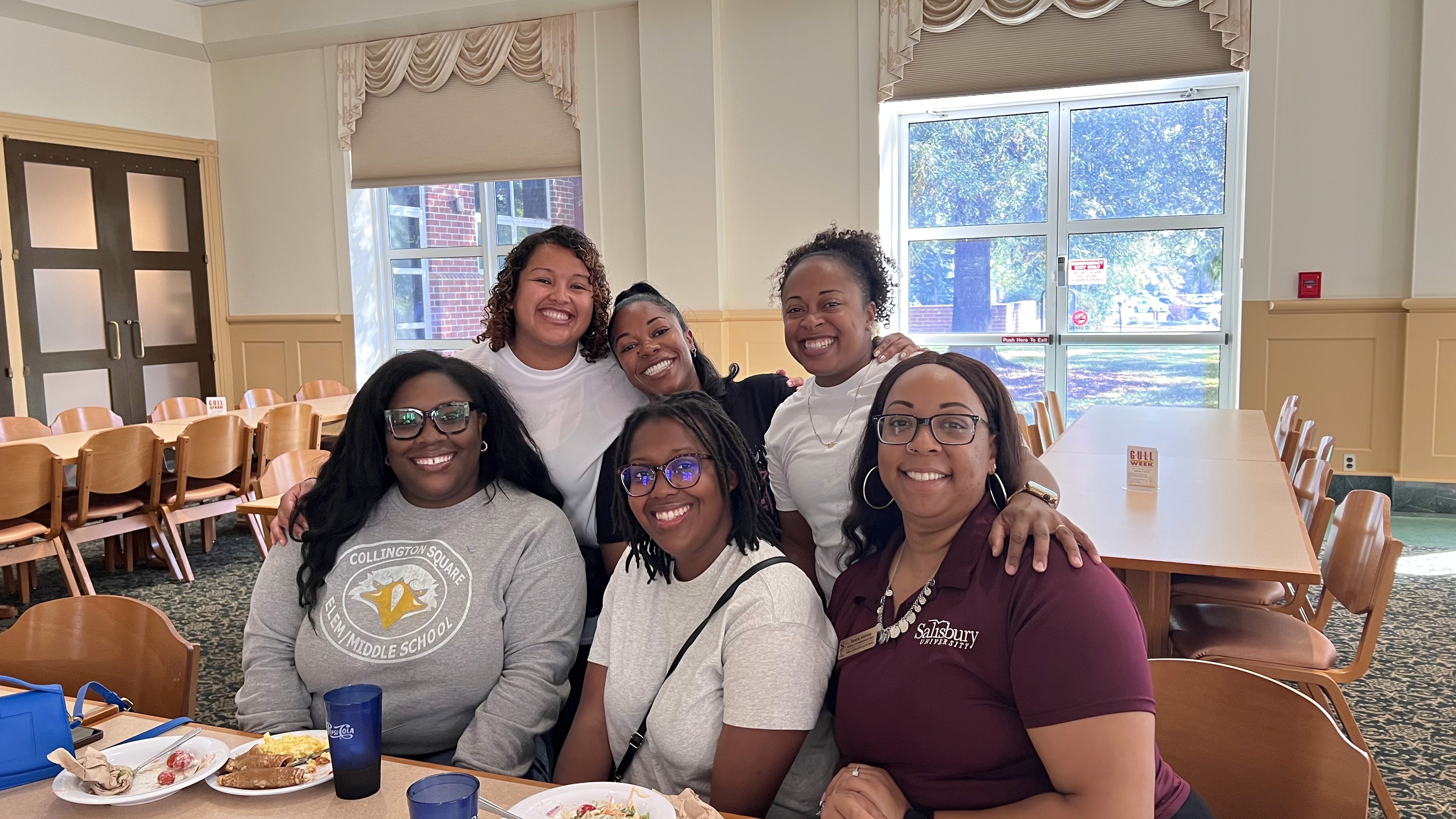 Alumni celebrating at a social gathering