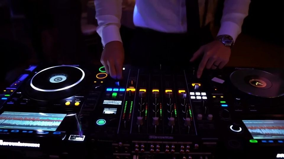 Wedding DJ working the decks.