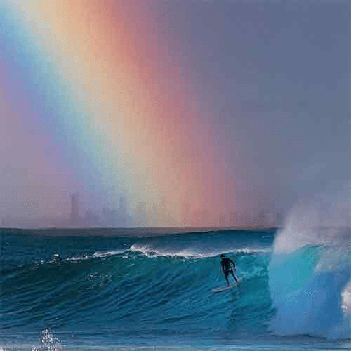 Surfer riding a wave under a colorful sky – surfboard rental gold-coast.