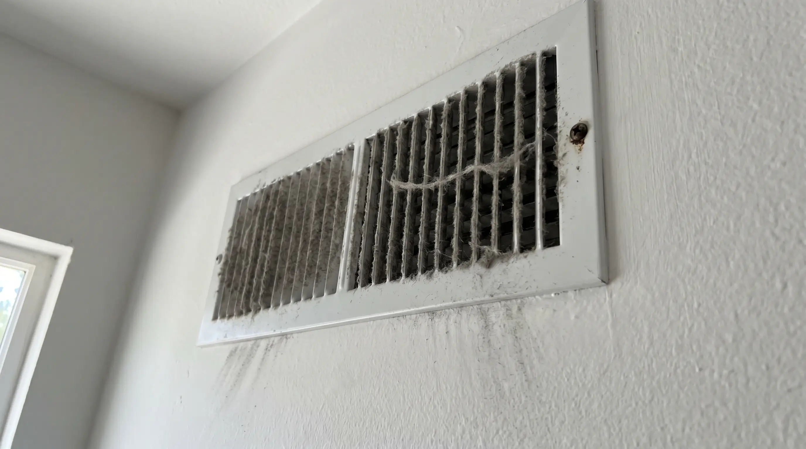 Vent registers collect their own dust layer — replacing the filter without cleaning the vents is half the job.