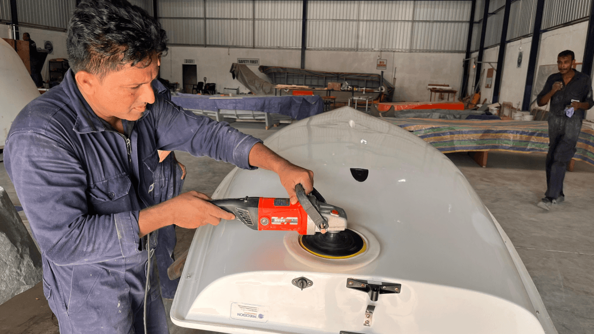 a person swimming in the water with grass
