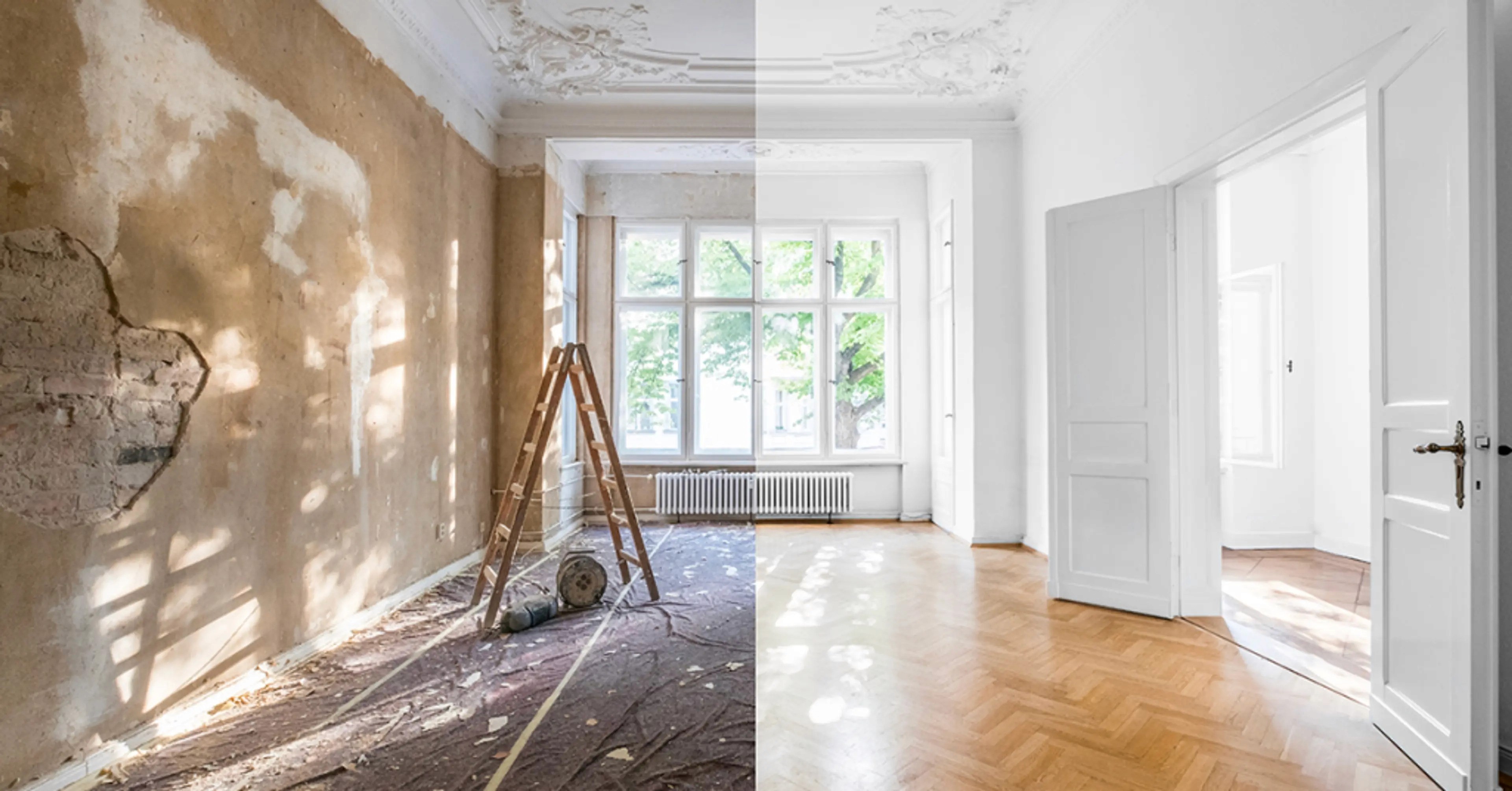 Dining area with wooden table and chairs, stairs nearby.