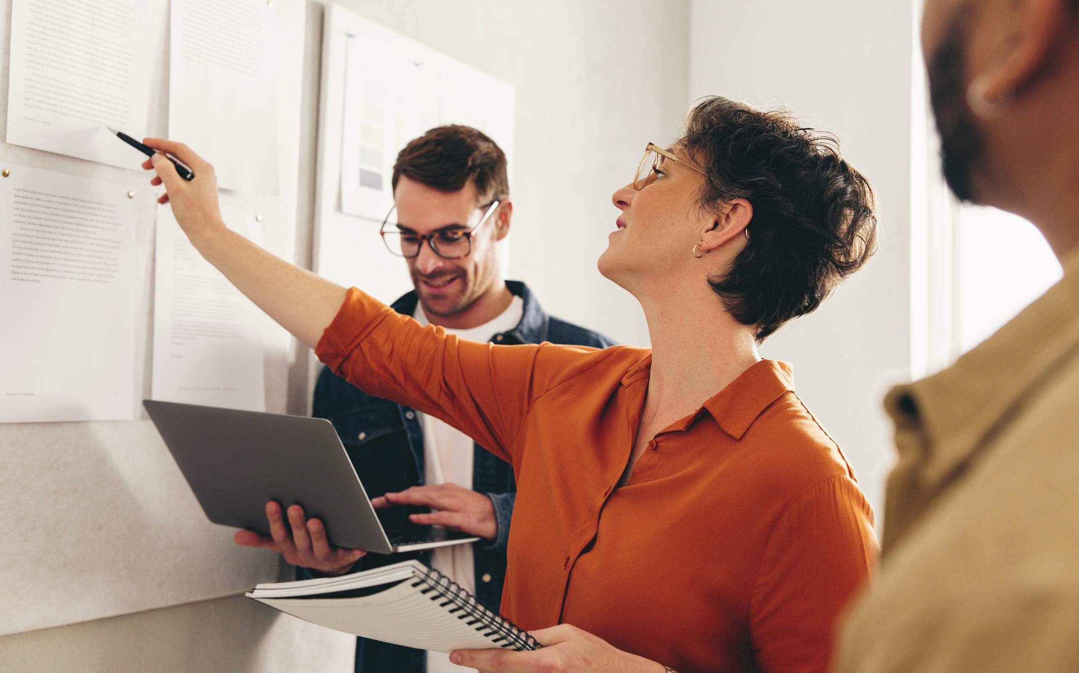 A woman on a whiteboard