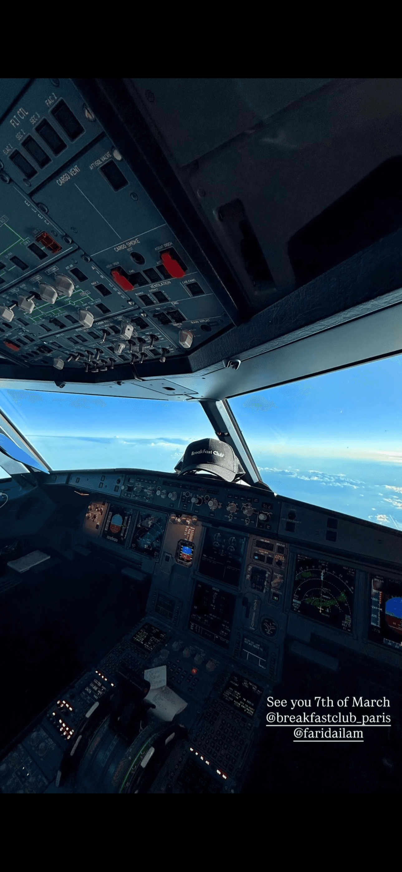close-up image of a guys shirt wearing a lanyard