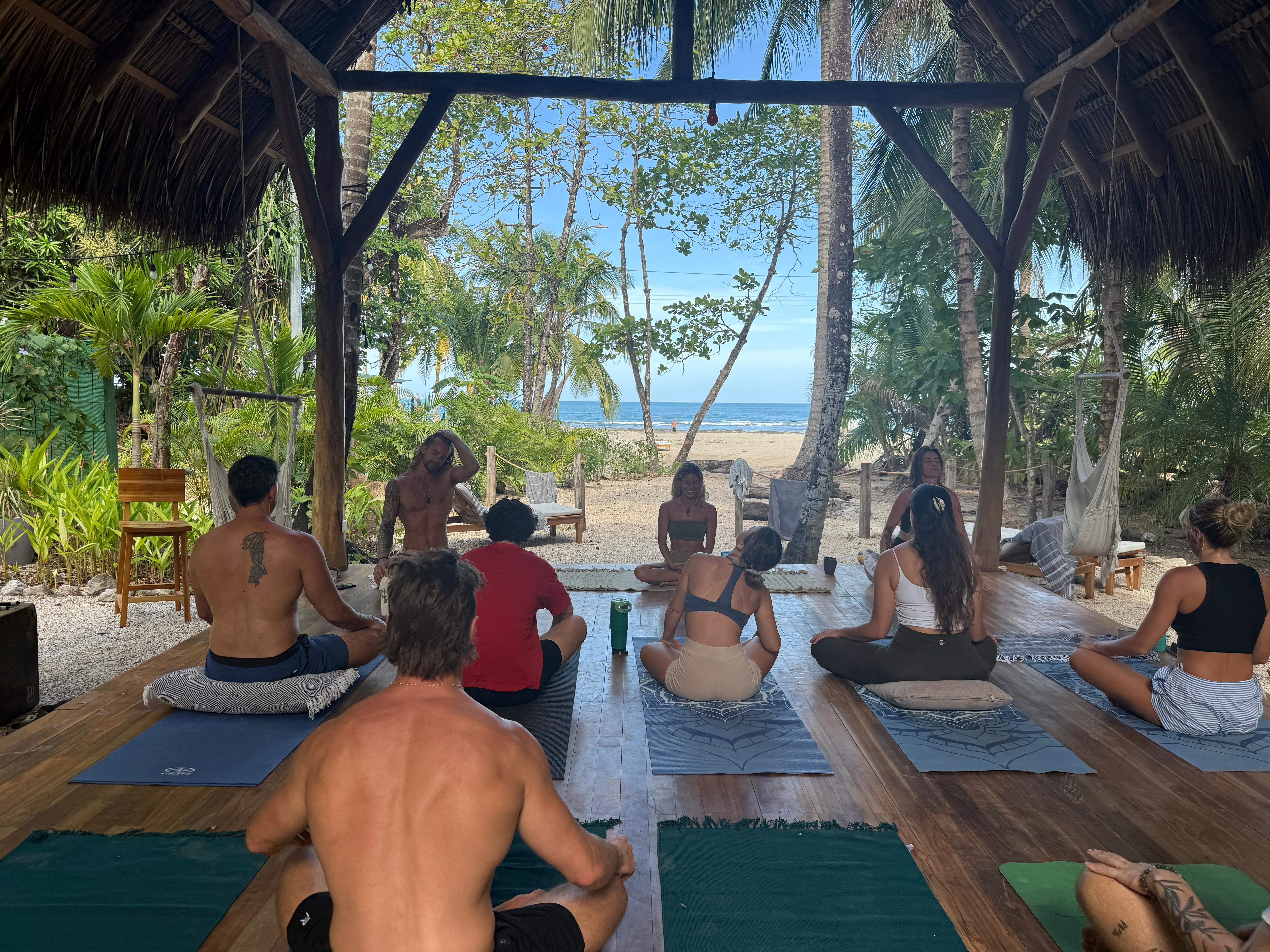 Close up of a woman with eyes closed practicing deep breathing