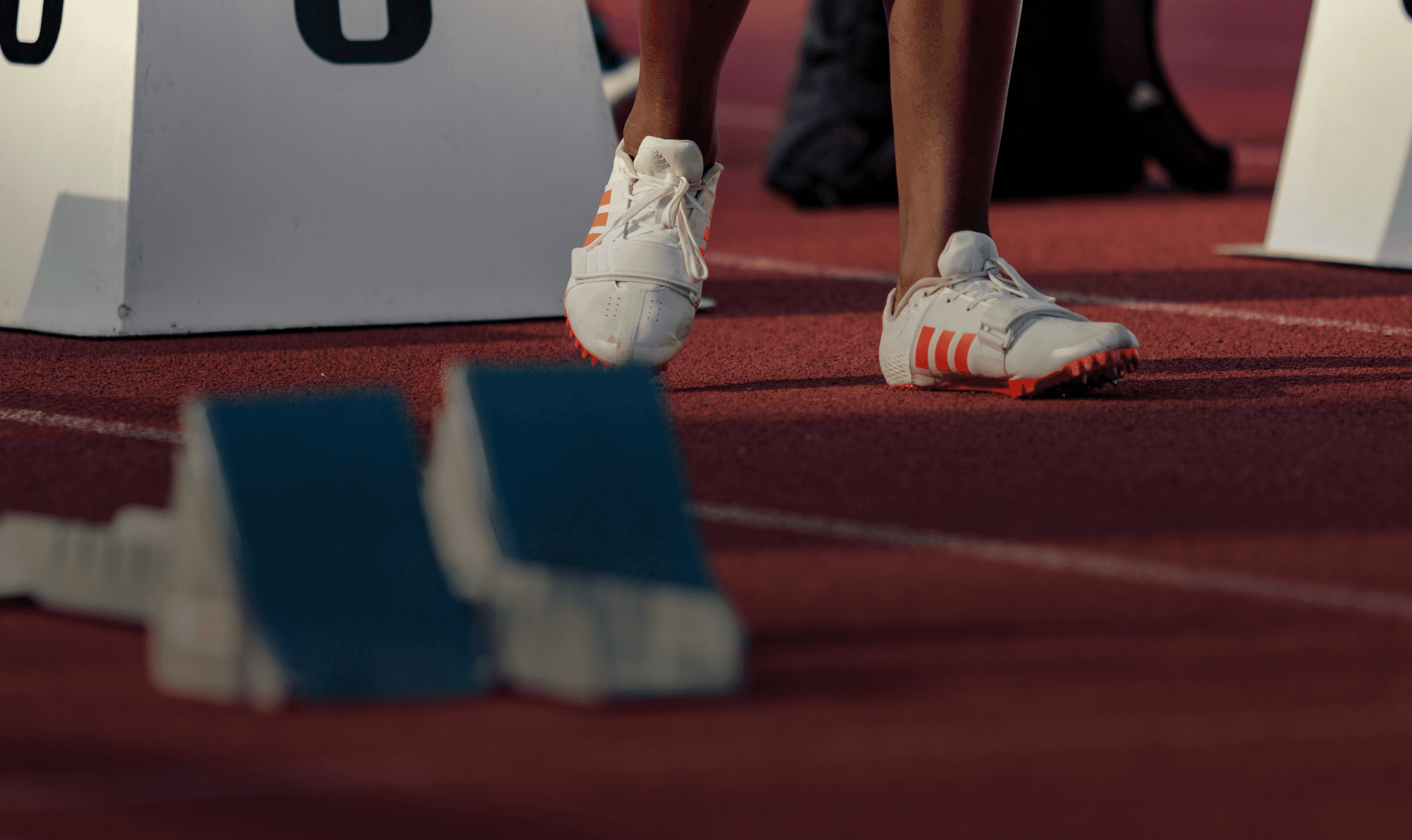 persons feet on sprint track