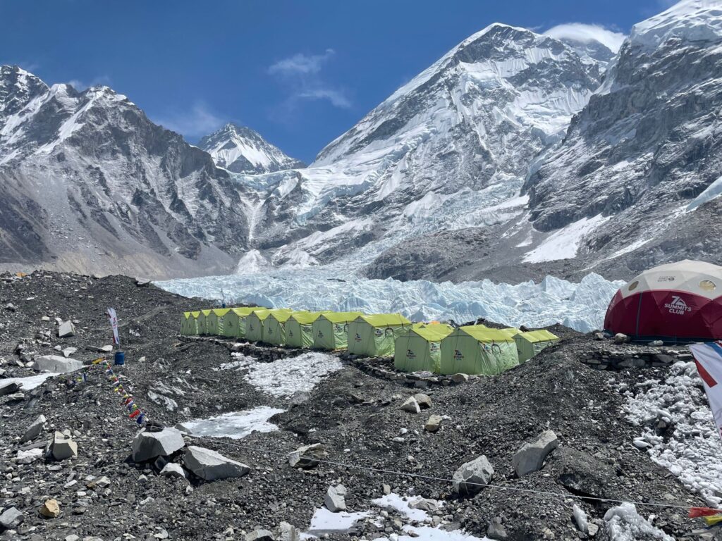 blue lake in the middle of rocky mountains