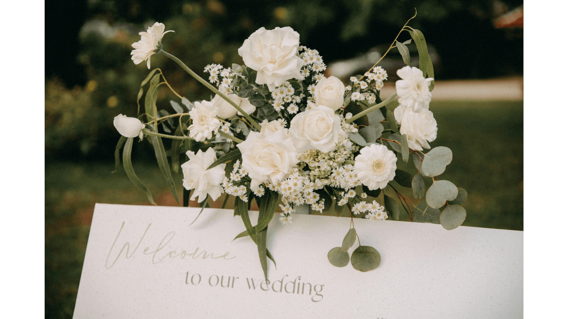 silver-colored ring on top of red roses