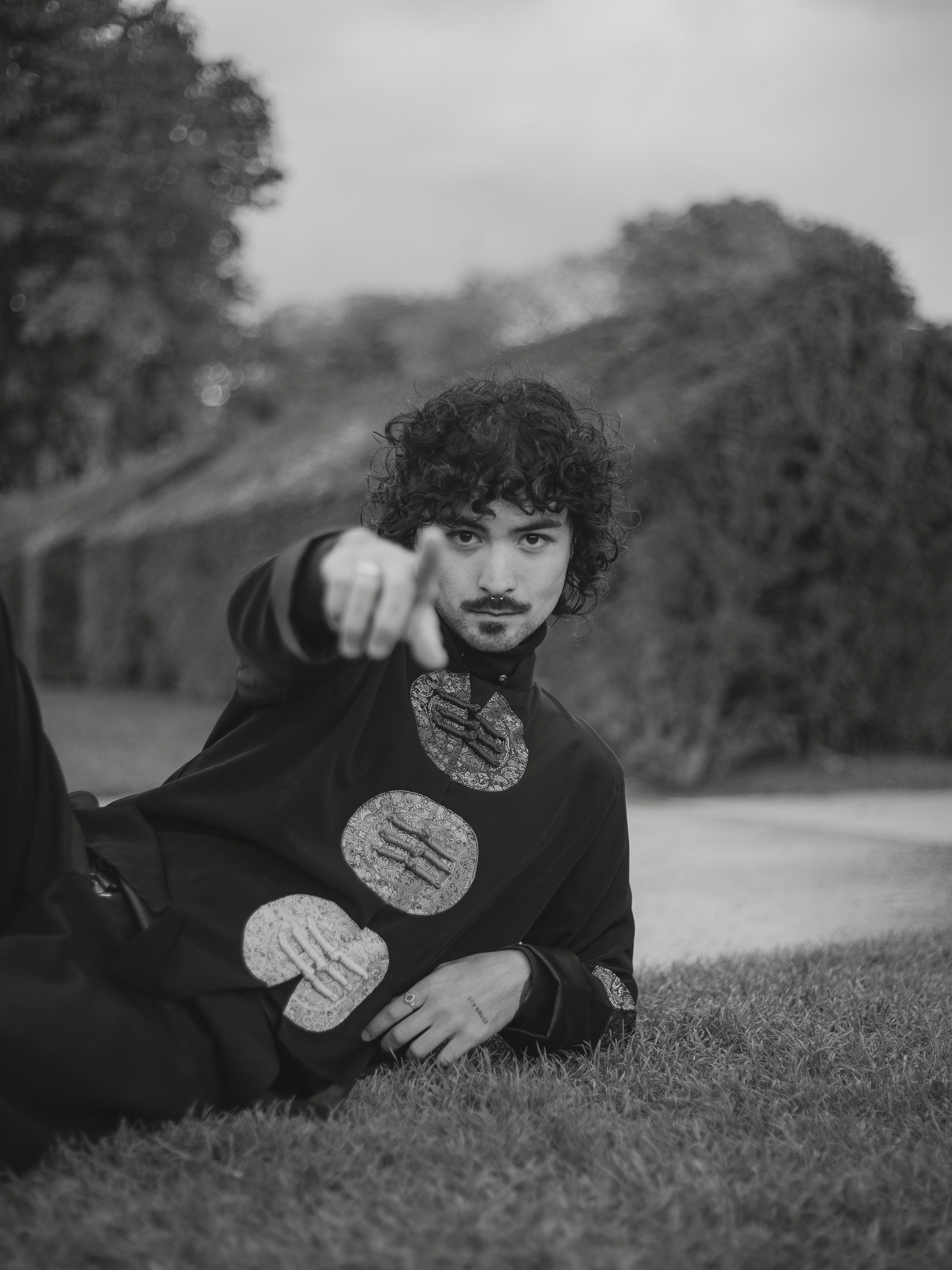 a blurry photo of a person standing in front of a wall