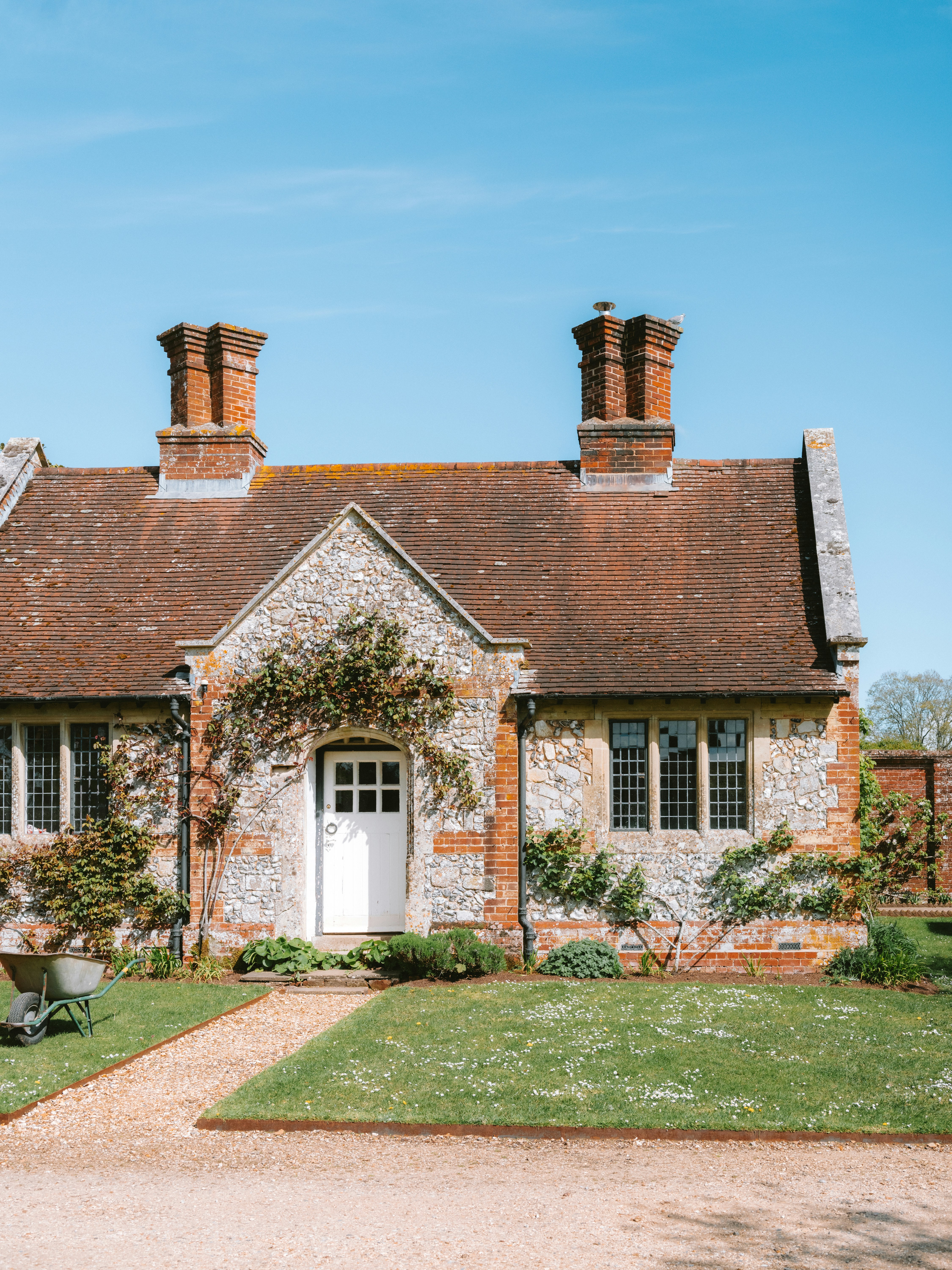 Charming stone cottage with red tile roof