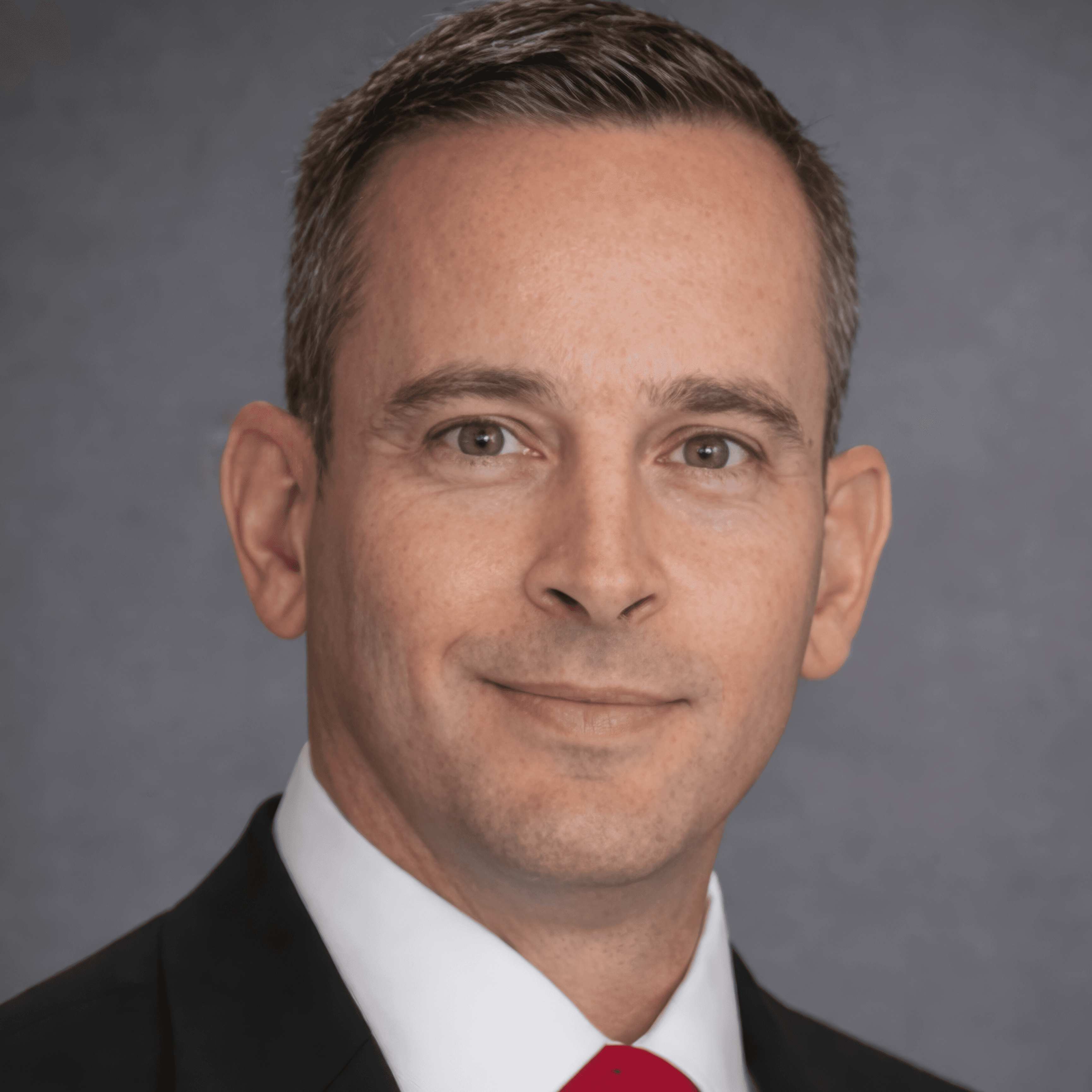 Portrait of John Doe Anderson, CEO of Omnis.