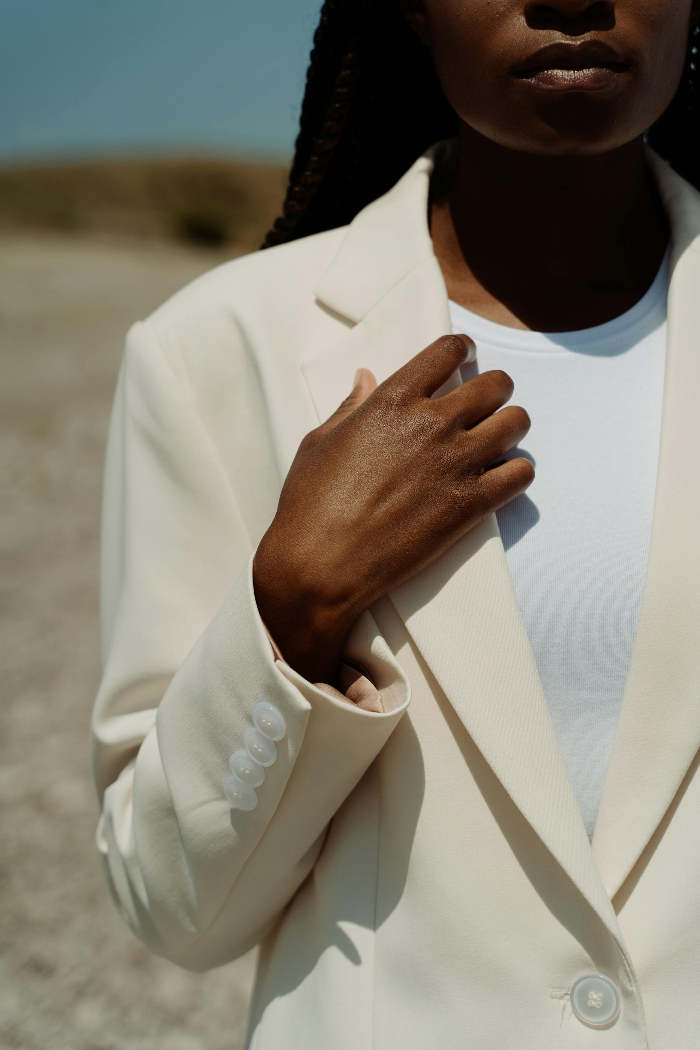 Black woman wearing white clothing