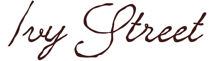 A woman sitting in a photo studio