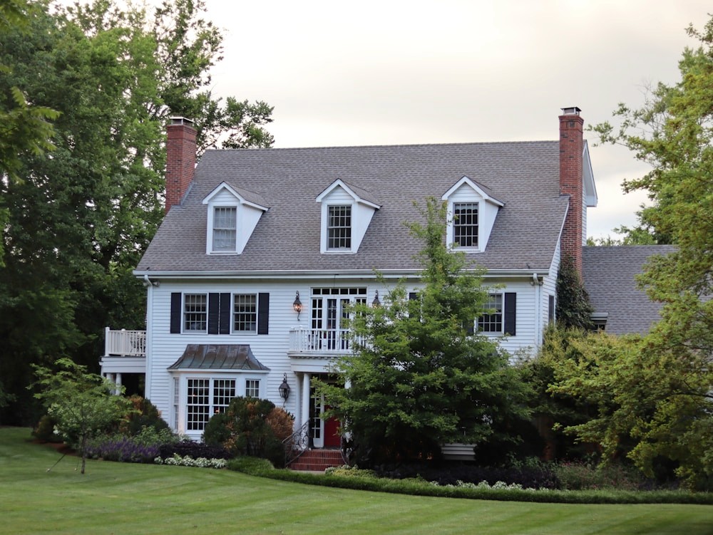 Roof replacement in progress on an older Lakewood home