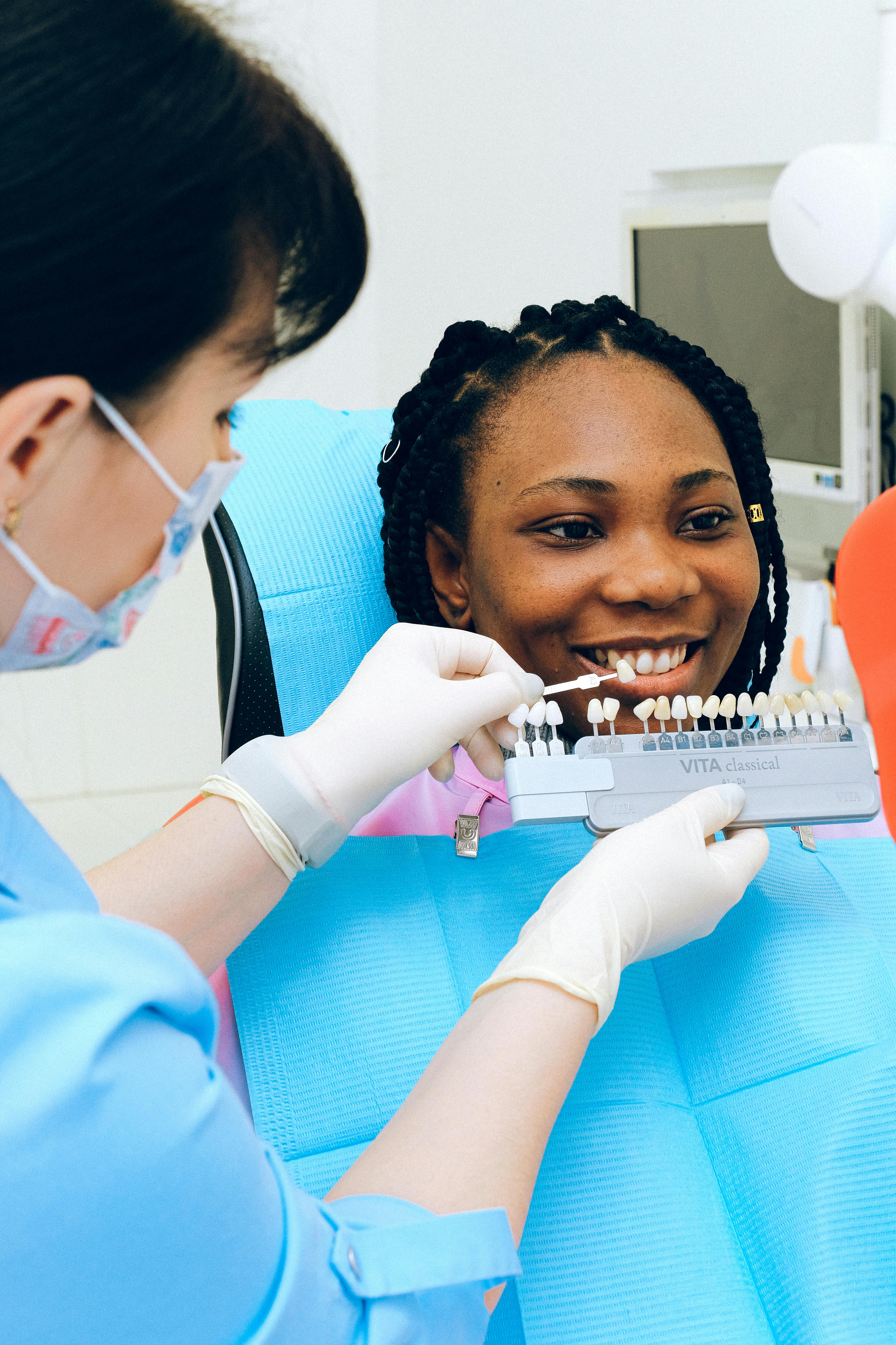 A dental team reviewing a patient's chart, while Nex.ad works in the background to target new local patients.