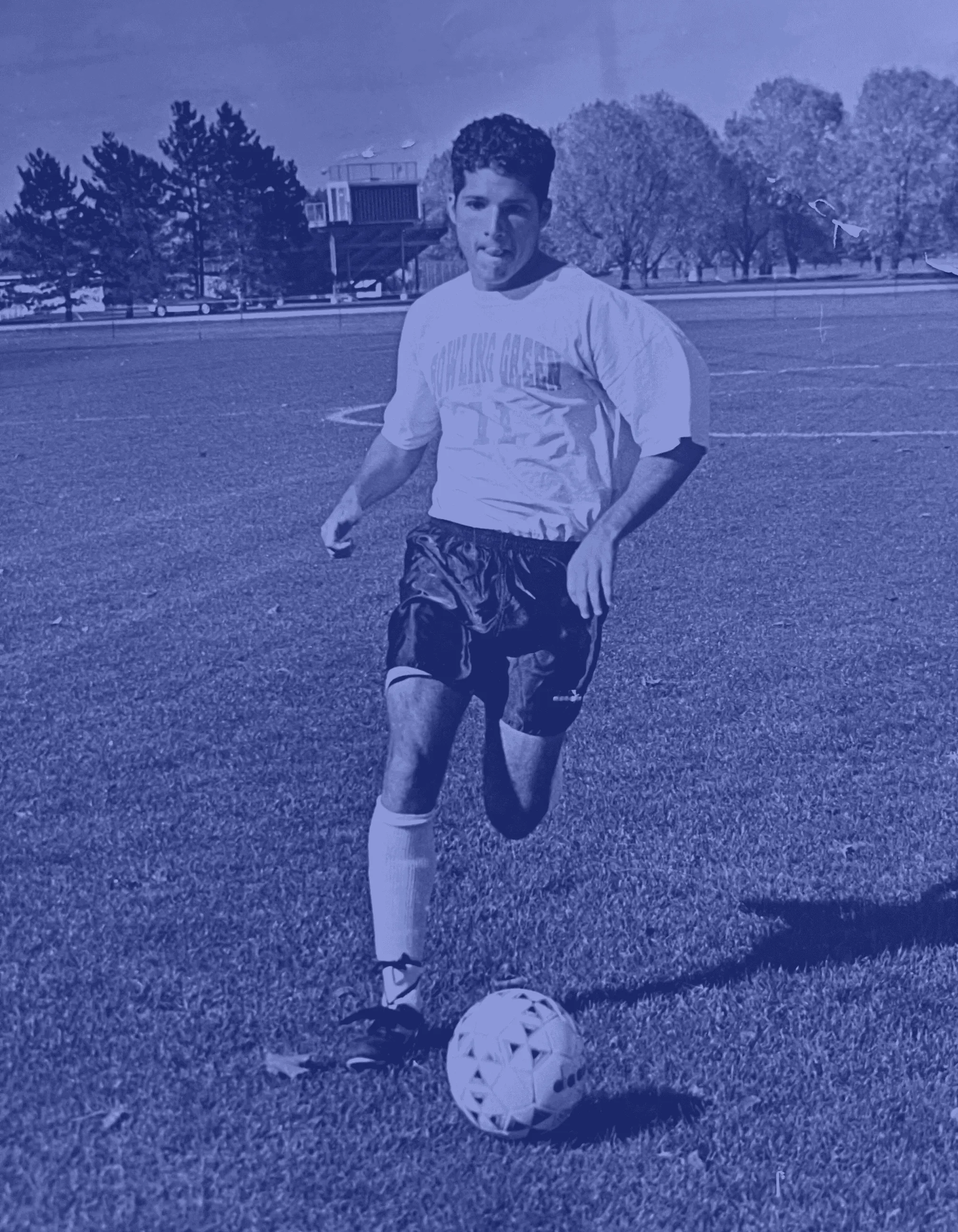 young jon playing soccer