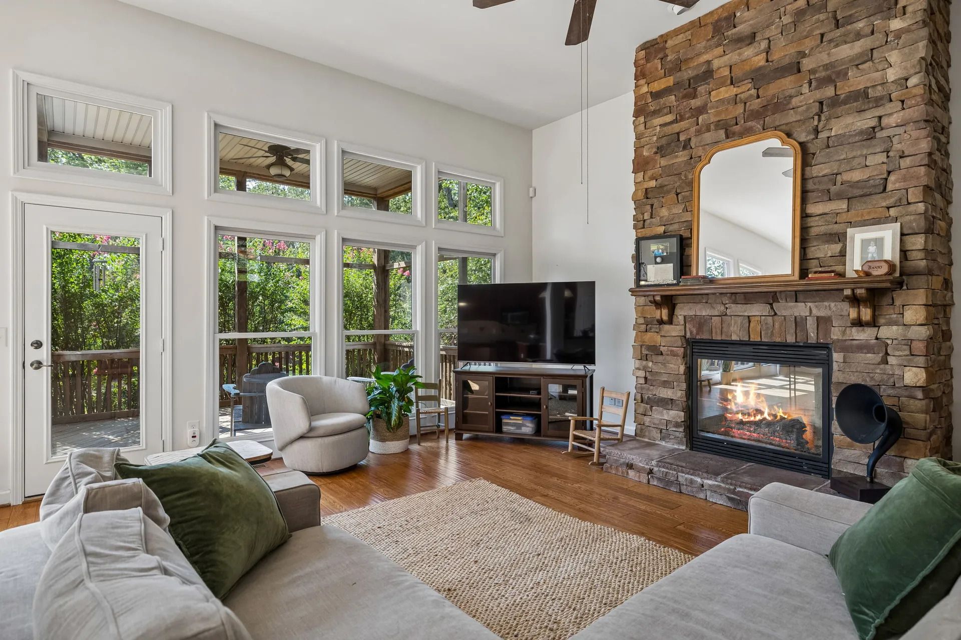Living room with stone fireplace