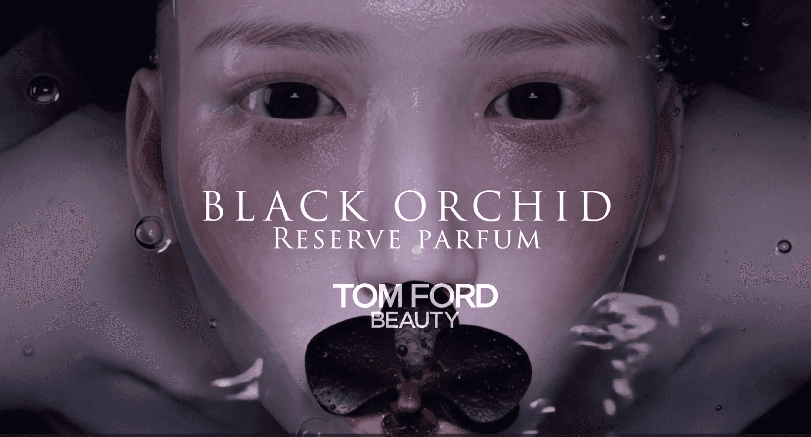 Close-up of a model submerged in dark water holding a purple orchid, from a luxury commercial concept for Tom Ford Beauty Black Orchid Reserve Parfum by Atomic Models creative studio.