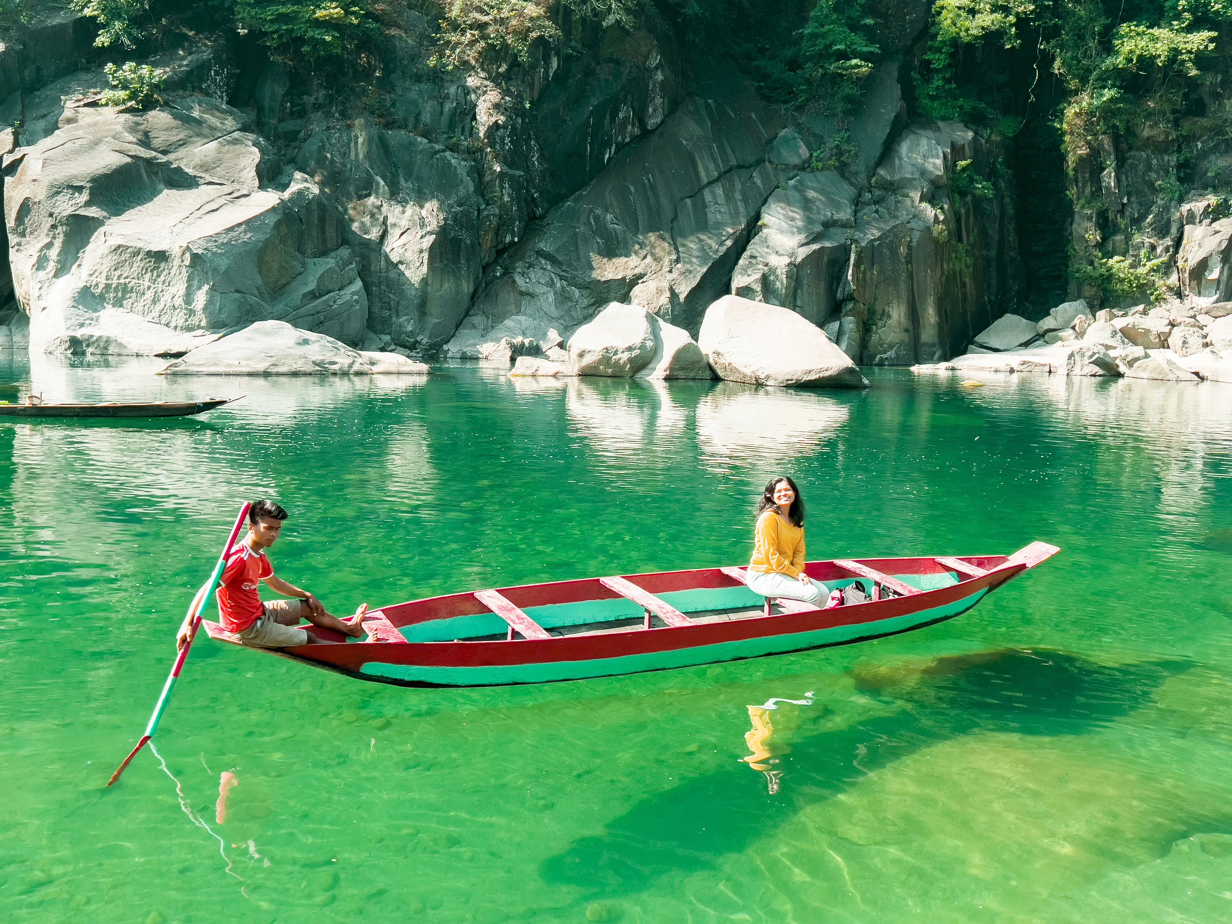 Boat on emerald river