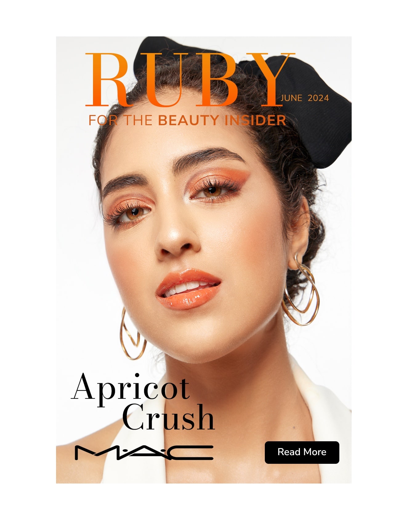 Group of friends smiling on a lively city street at night