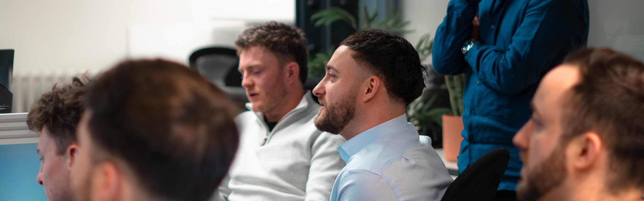 The PSS Tax team reviewing a claim together at the Manchester office