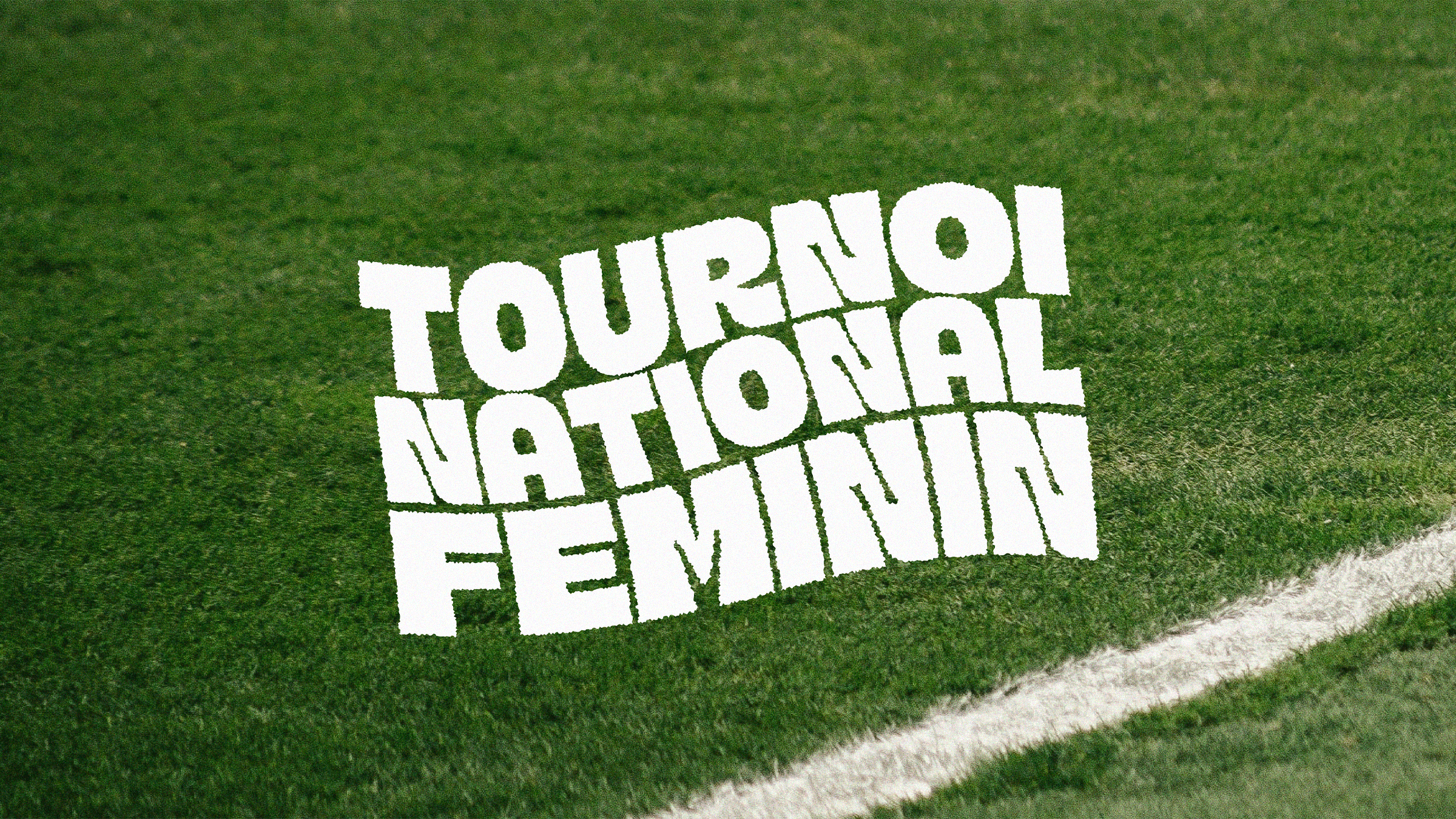 Modern home office setup with a monitor, ergonomic chair, keyboard, and indoor plants near a window with blinds.