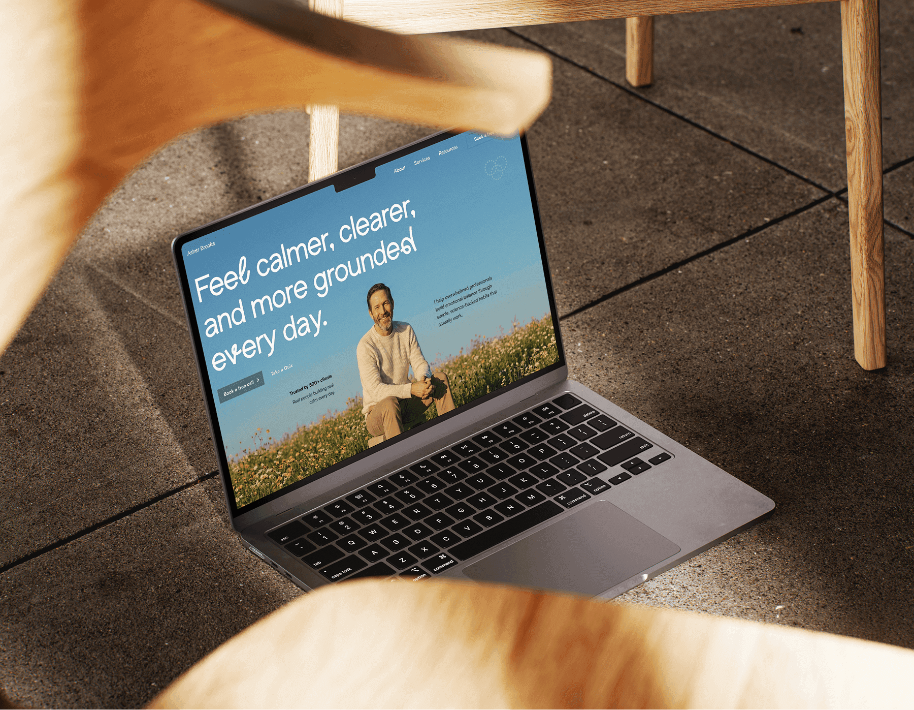 Laptop showcasing asher brooks landing page