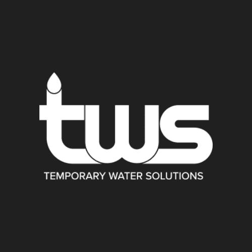 Man and two girls taking a selfie in a tent