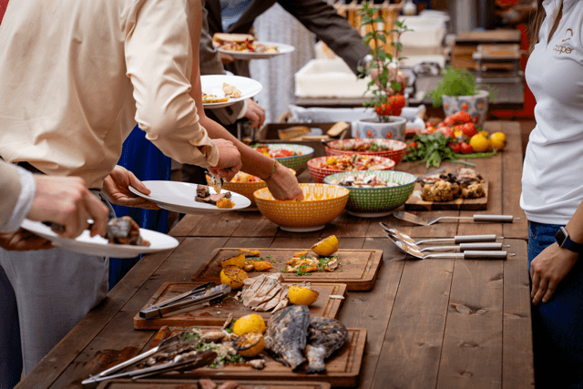 Professional catering team operating within a premium venue