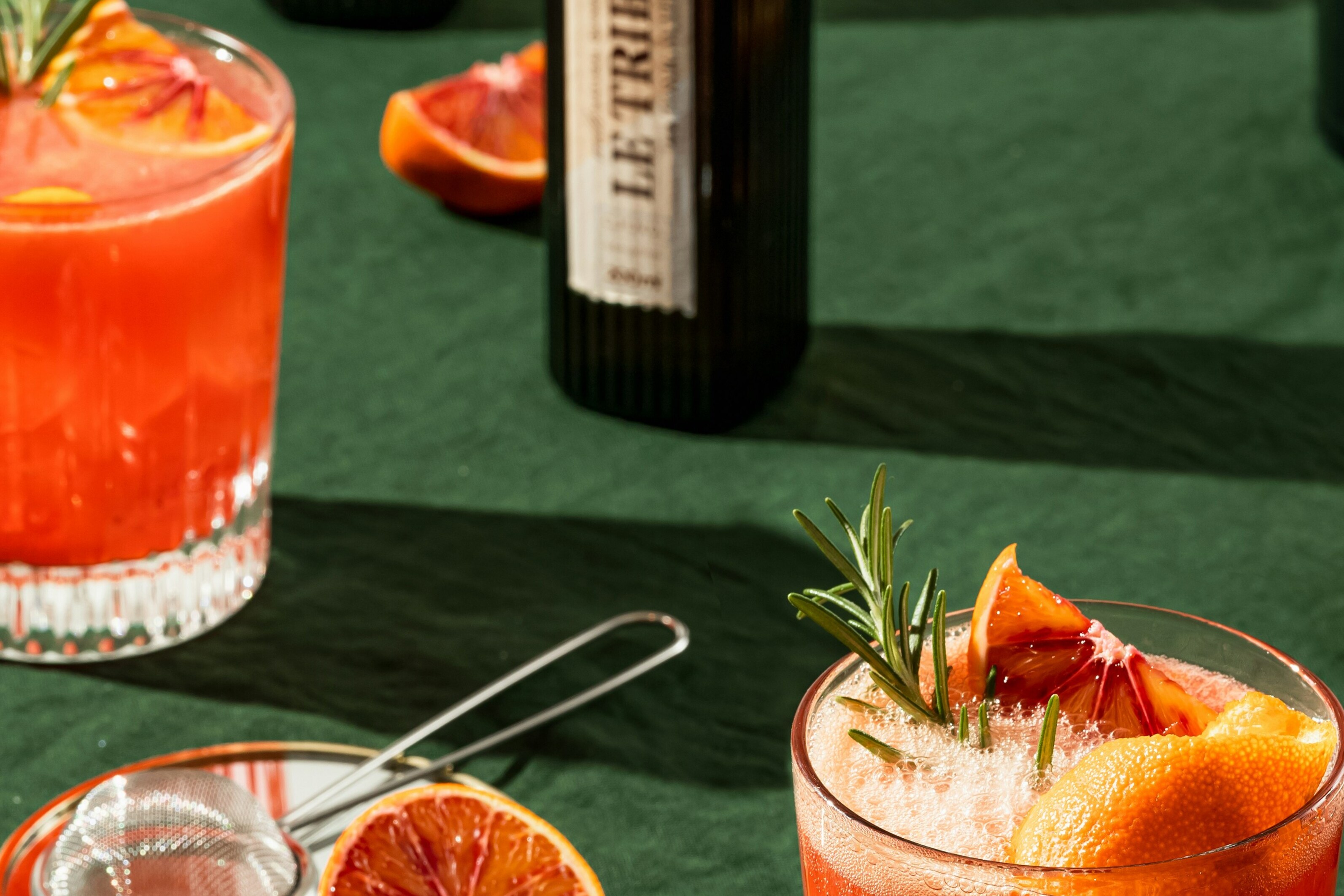 four glass cups on white surface