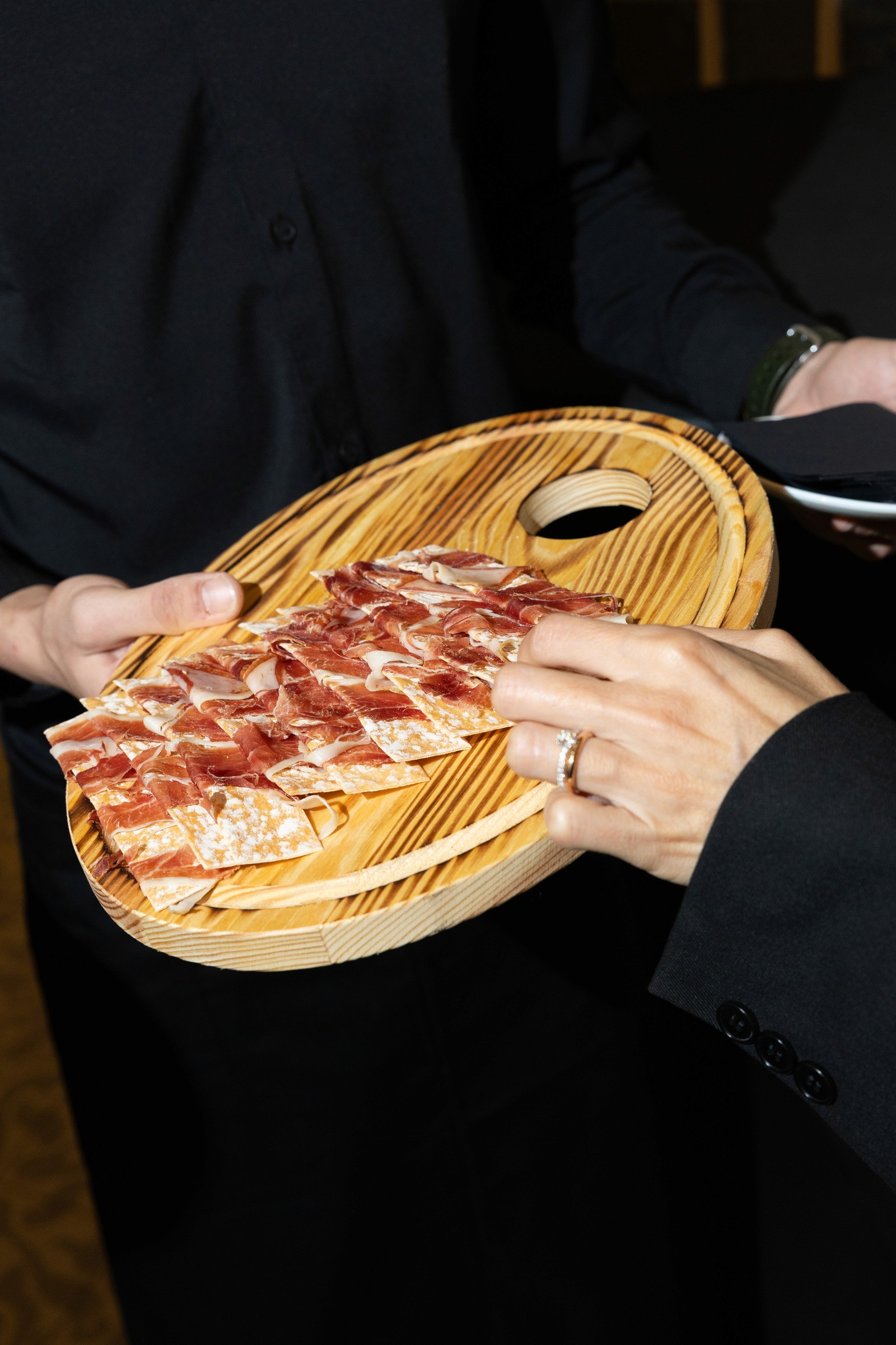 Cured ham served on a gold platter