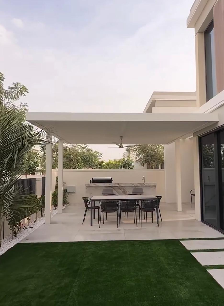 Modern villa facade with timber cladding