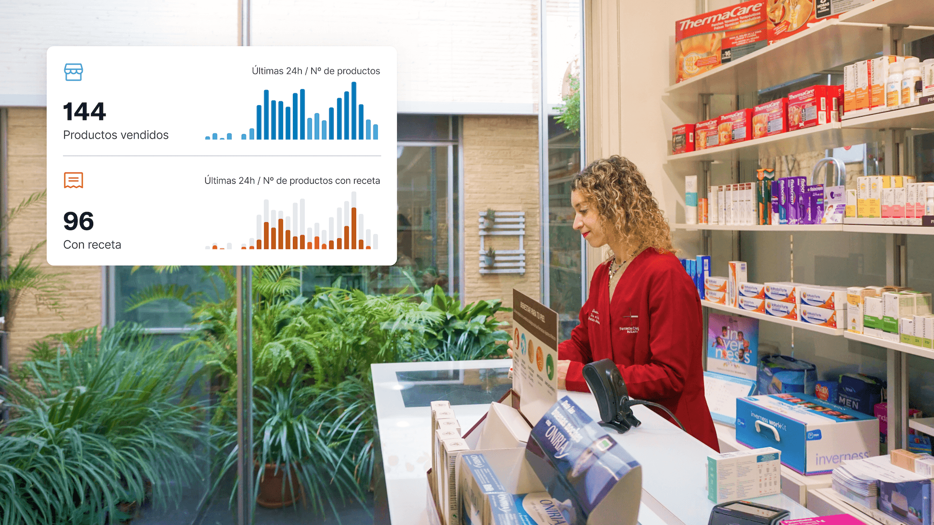 A pharmacist working at the desk of the pharmacy