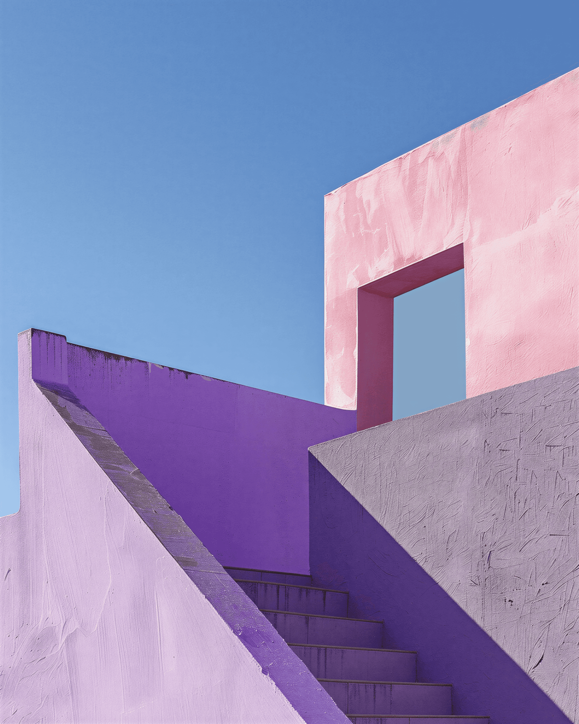 White building with pink door under blue sky, pink ground