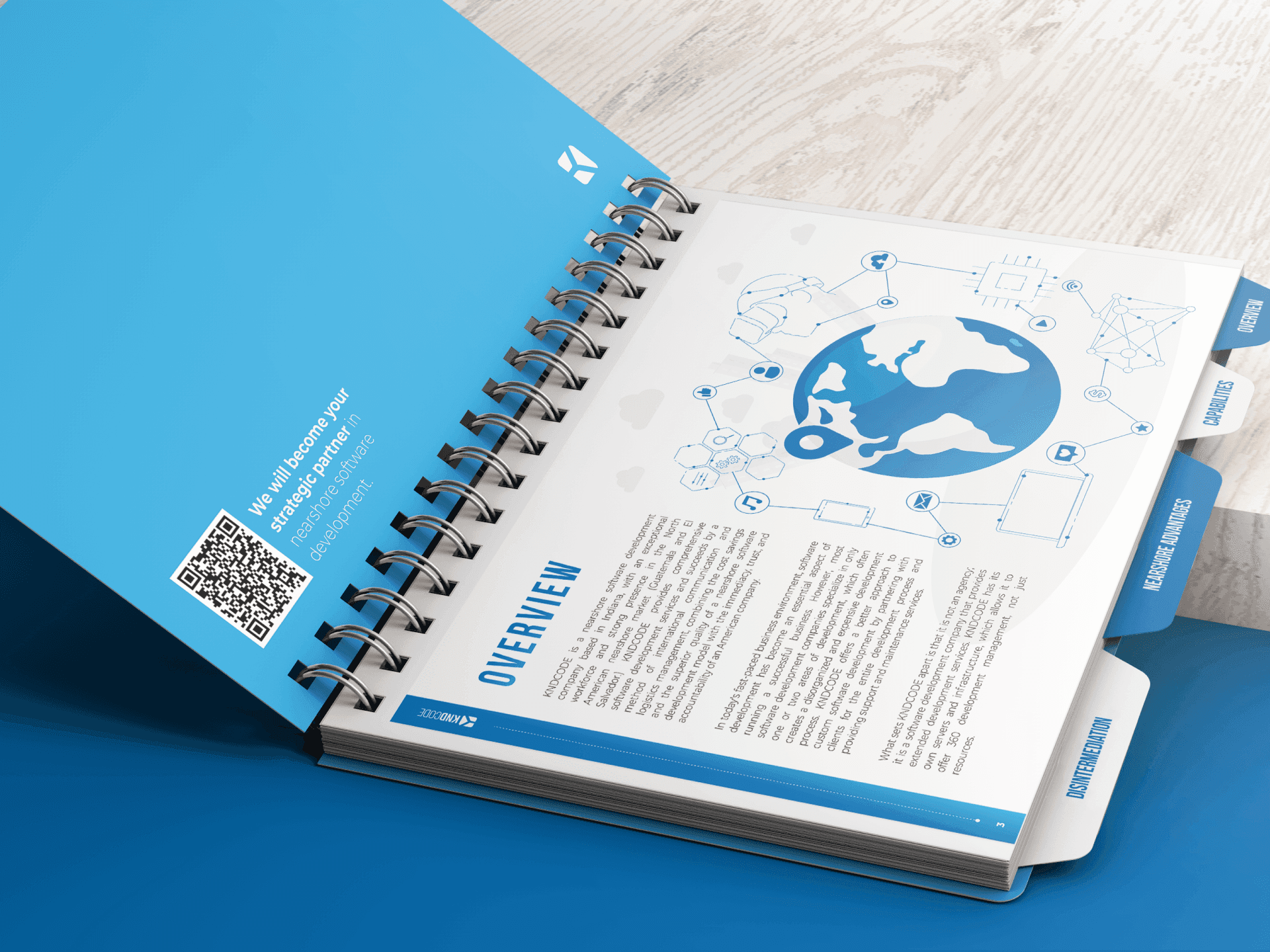 Open iBook spread showing new layout grid, icons, and blue palette.