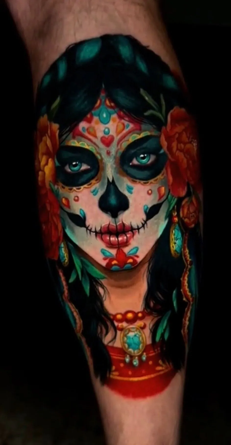 Color Day of the Dead woman tattoo portrait on arm at Calavera Ink Berlin