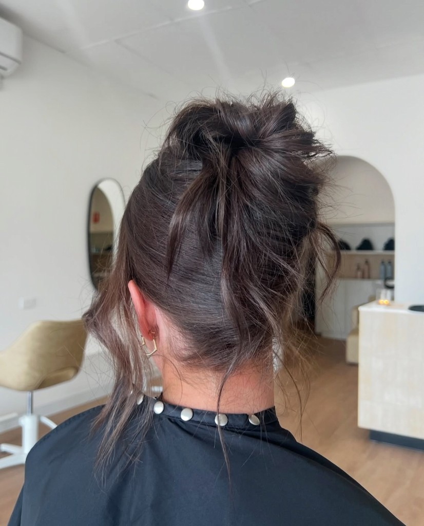 Model with brown hair clipped up done by Goldi