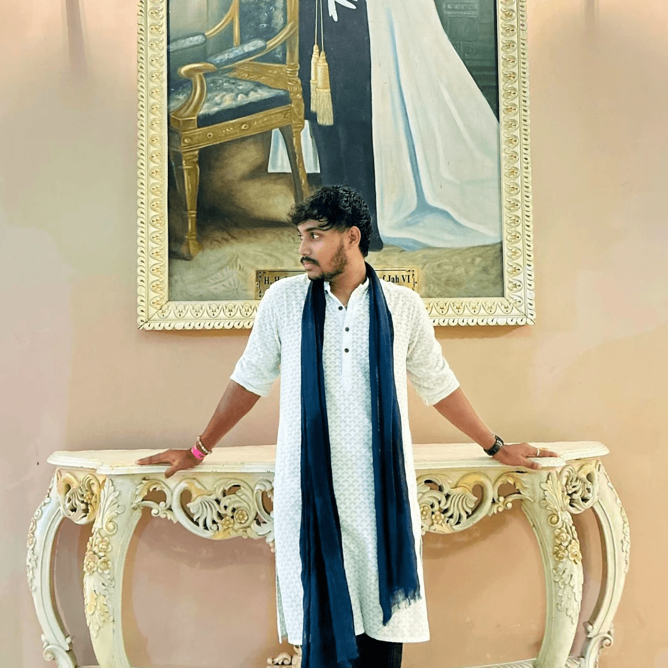 A boy in shorts and cap on his hat