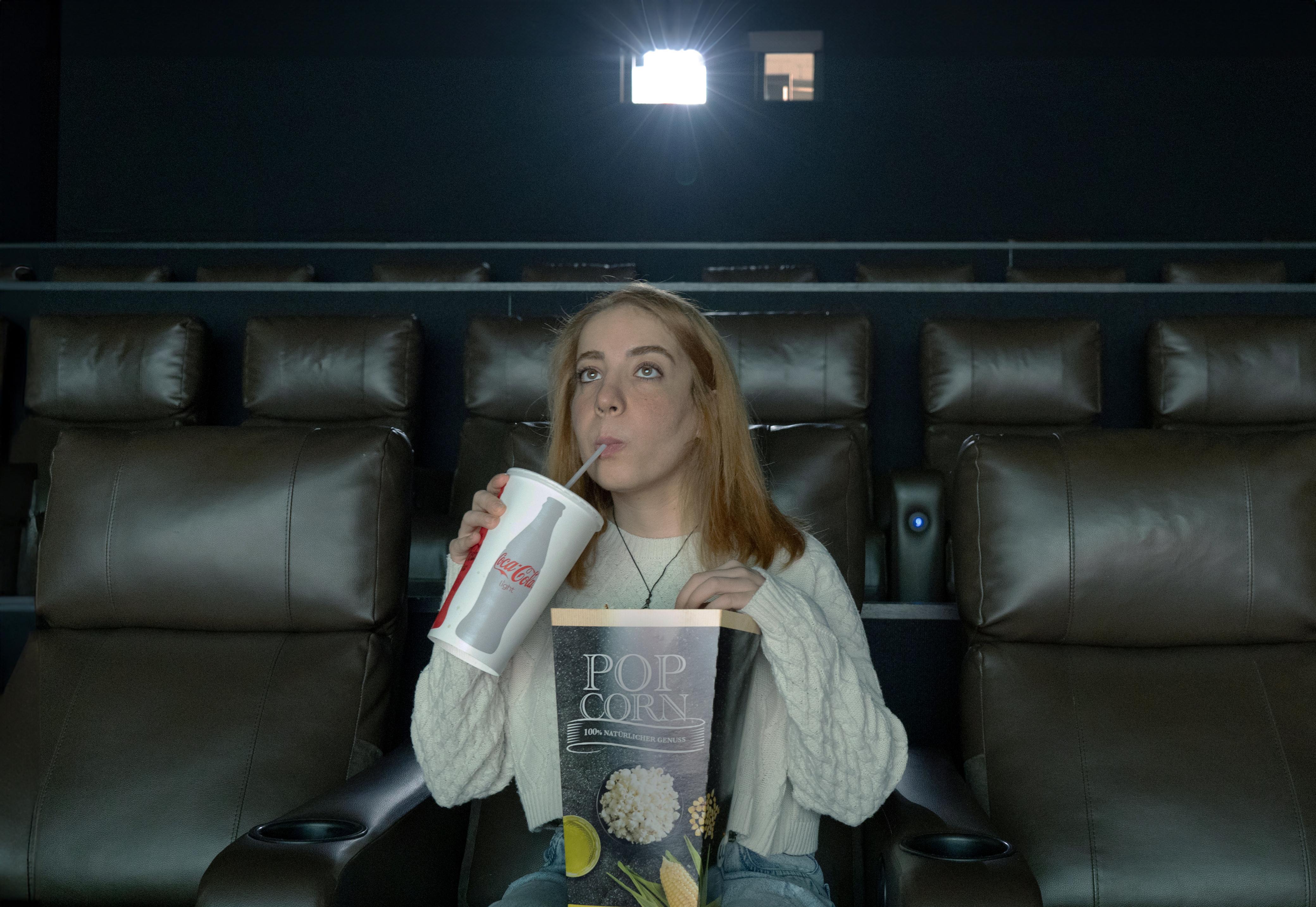 Fashion photoshoot with a woman posing in a dress