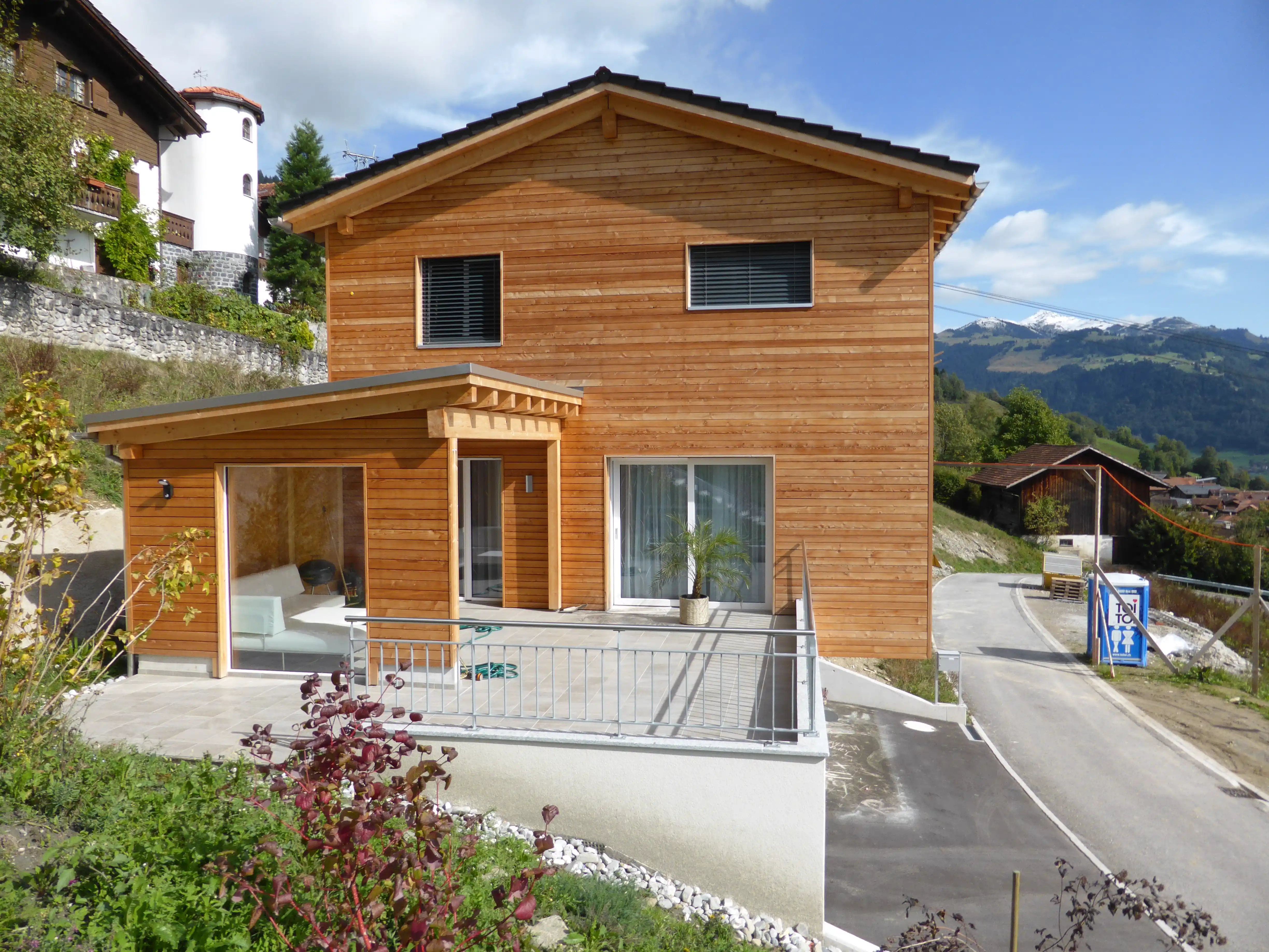 Neubau Einfamilienhaus Fanas mit wunderschöner Holzfassade - Niggli Architektur