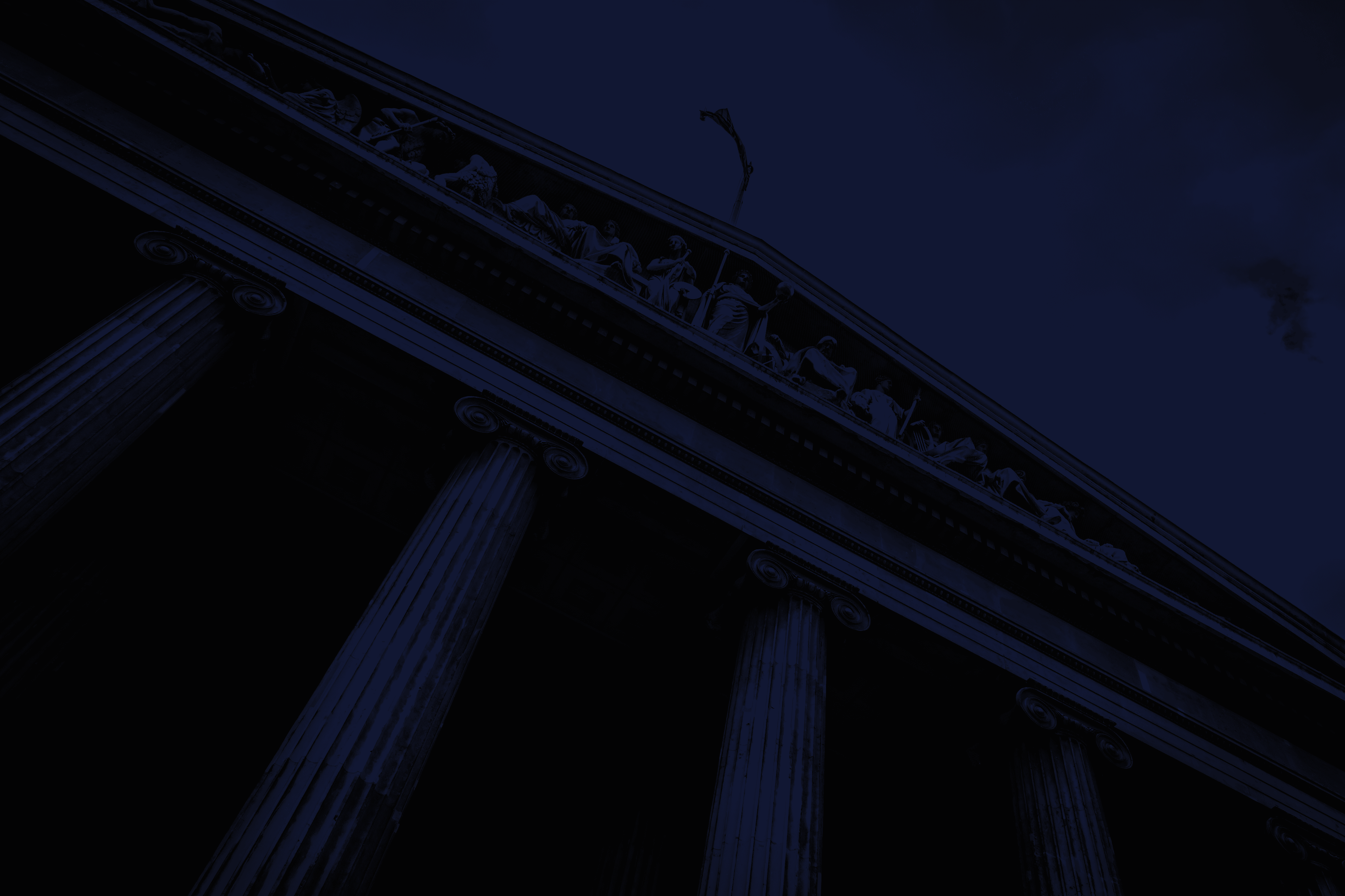 low angle photography of beige building