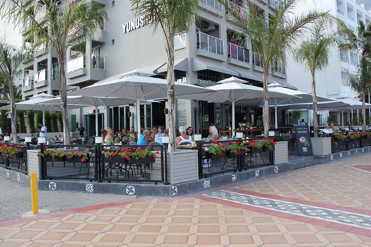 husband and wife working happily on a laptop