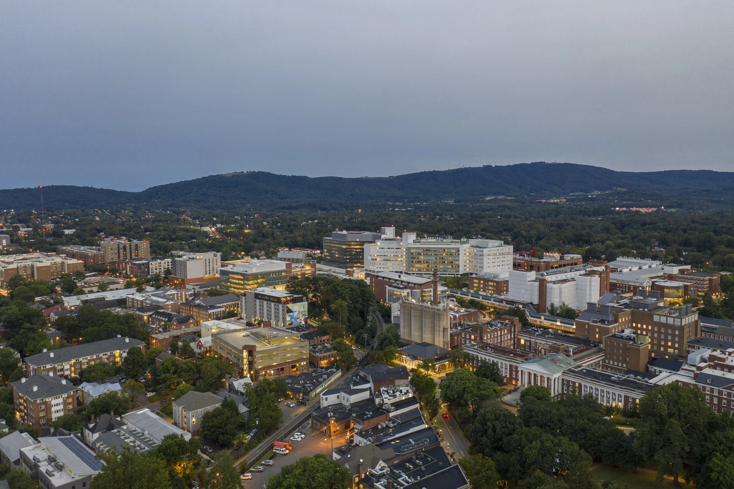 Two healthcare professionals reviewing patient information together on a tablet