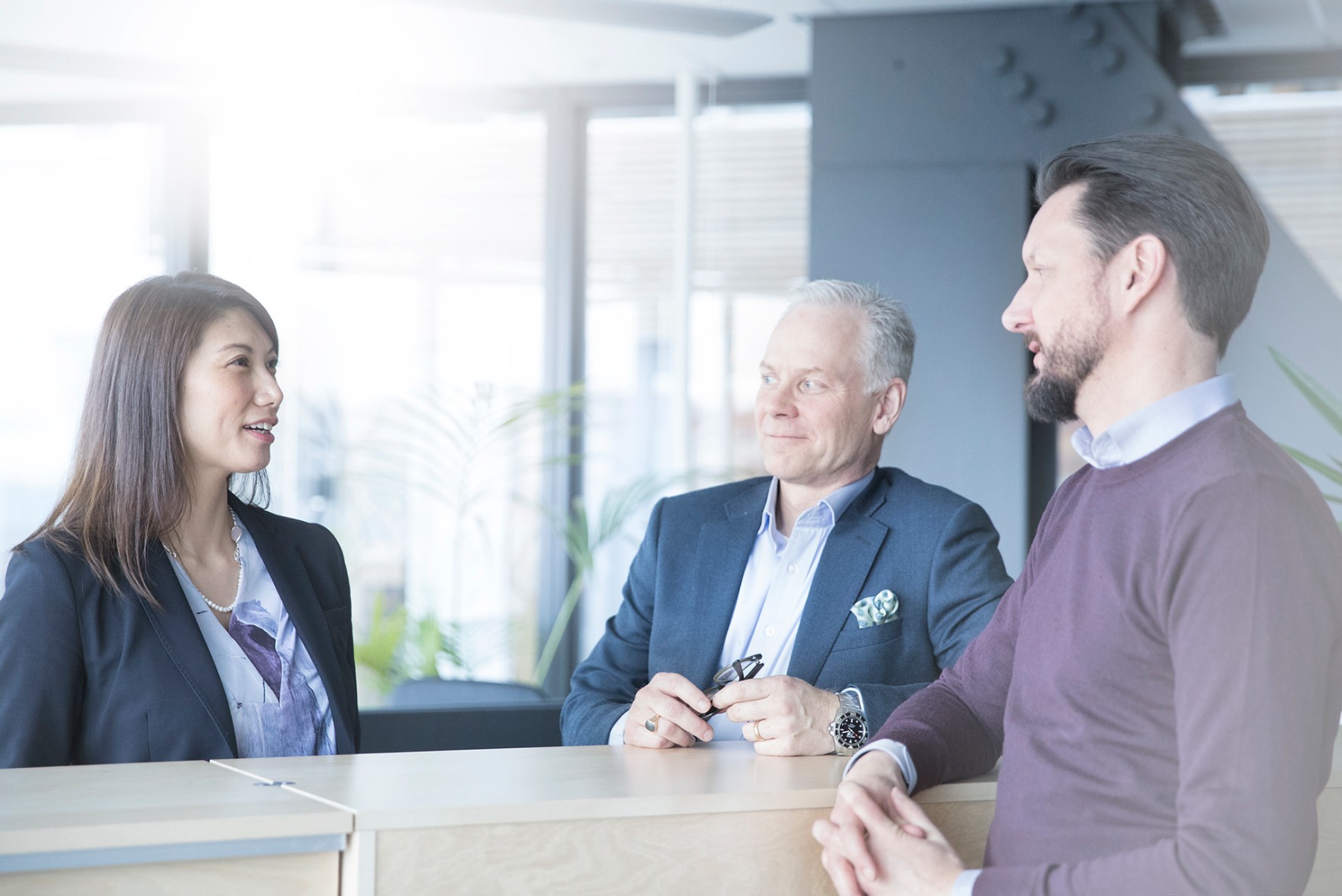 a woman looking at phone screen