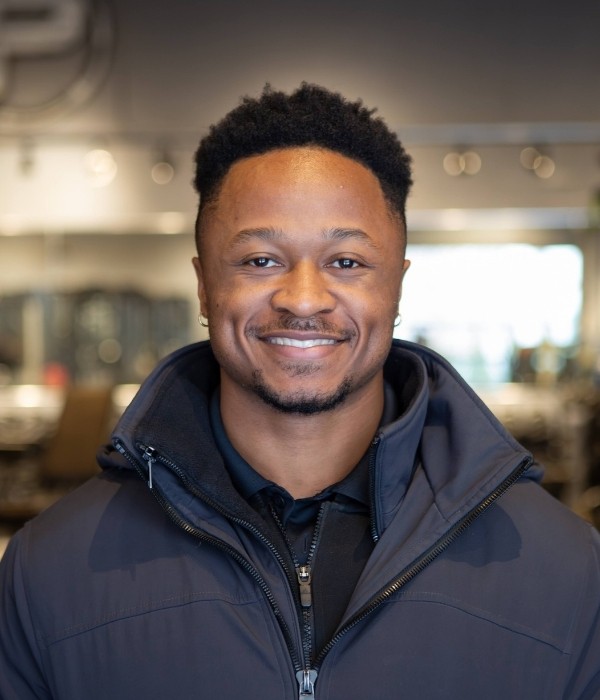 black and gray dumbbells on brown wooden crate
