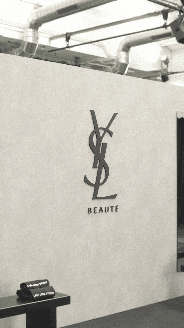 Bride in white dress walking on street, blurred motorcycle passing