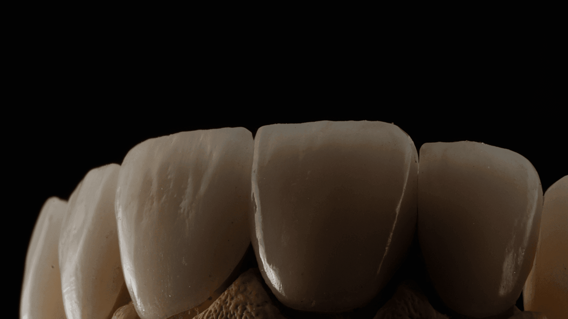 a white car parked in front of a building