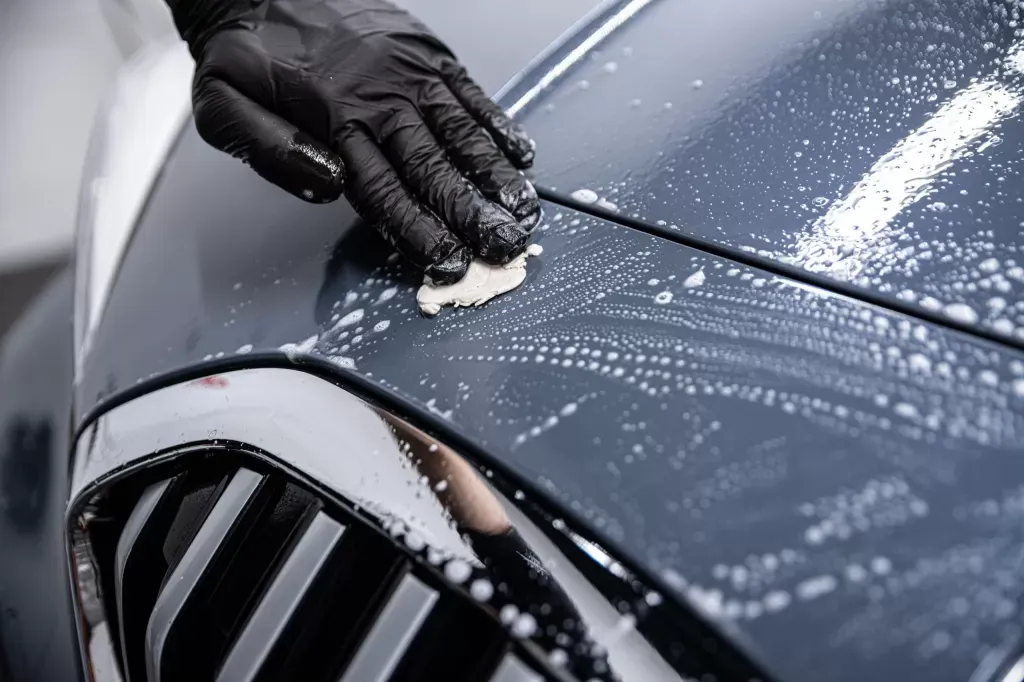 image of a car with snow foam dripping off it
